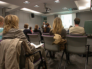 Courses small Course participants following a lecture in a class room