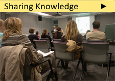 Course participants ponder over textbook